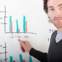 Man presenting graphs
