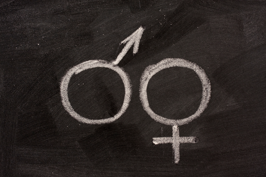 male and female gender symbols  on blackboard