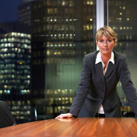 Woman standing at desk