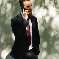 Businessman using mobile phone communication technology